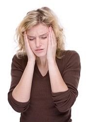 Full isolated portrait of a caucasian woman with headache