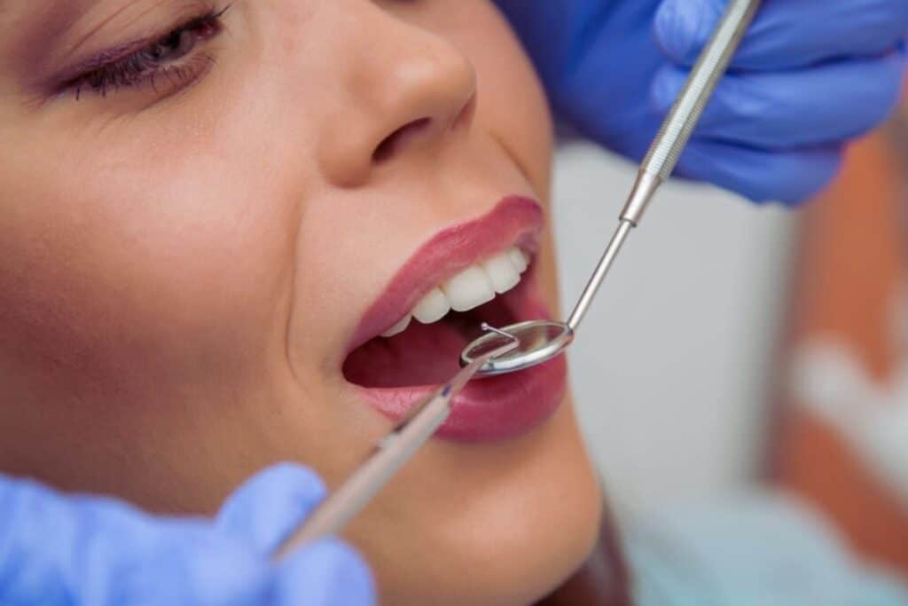adult having dental checkup for tongue tie treatment