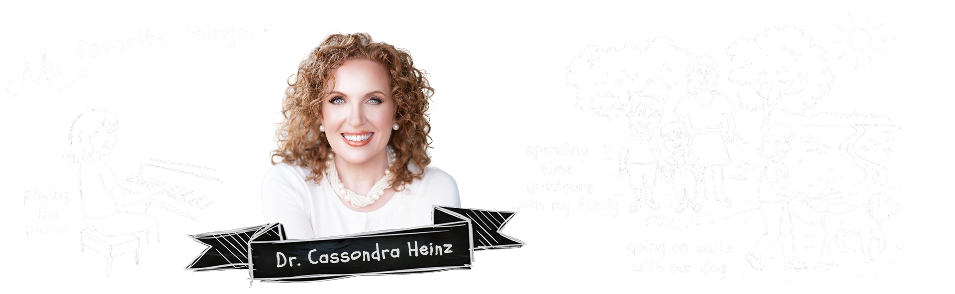 Woman with curly hair smiling, wearing black banner with text across chest, white background.