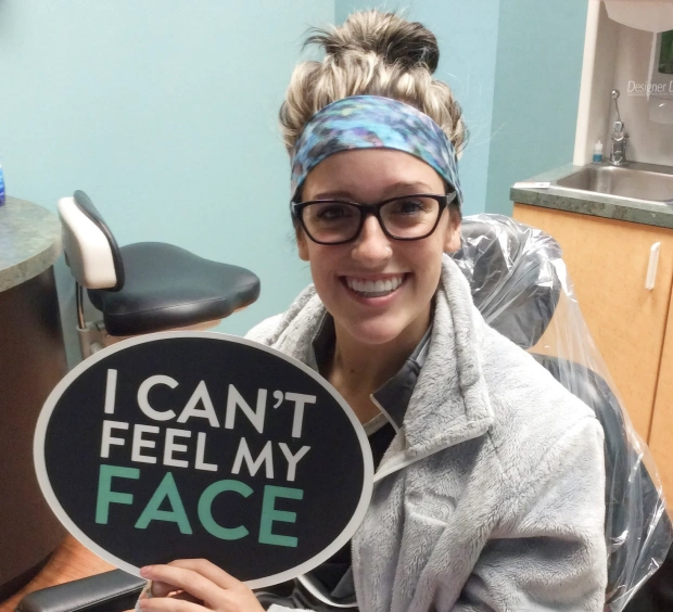 Woman smiling during a cosmetic dentistry consultation