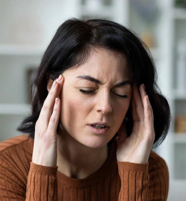 Woman experiencing tooth pain